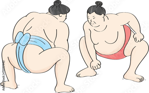 The two suma wrestlers look at each other.