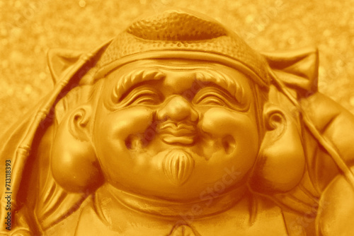 Face of Japanese fortune god statue. photo