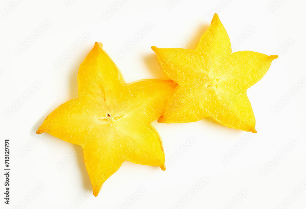 Top View of Two Juicy Fresh Ripe Starfruit Slices on White Background Top View of Two Juicy Fresh Ripe Starfruit Slices on White Background