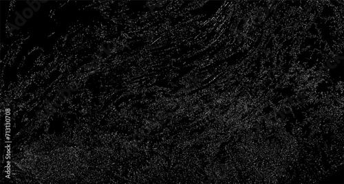 Black grunge background. Noisy vector texture consisting of points. The grungy background scratched the surface of the wall, paper, and metal. Grunge Texture.