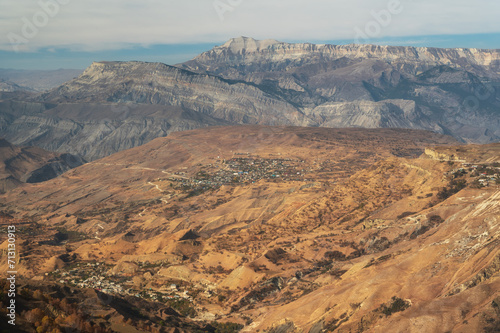 Panorama of the aul Matlas and the Caucasus mountain range. Dagestan, october 2020.