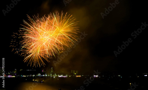 Spectacular fireworks exploding in to the night sky over the bay