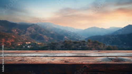 Wooden table mountains bokeh background  empty wood desk surface product display mockup with blurry nature hills landscape abstract travel backdrop advertising presentation. Mock up  copy space.