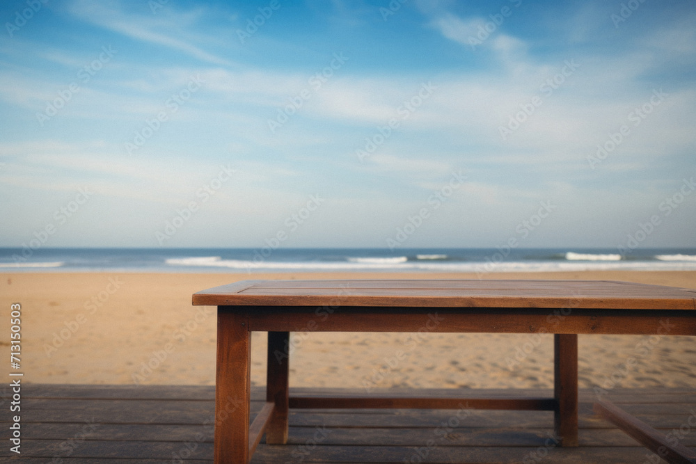 Wooden table ocean bokeh background, empty wood desk surface product display mockup with blurry sea water sunny beach abstract summer travel backdrop advertising presentation. Mock up, copy space. Wooden table ocean bokeh background, empty wood desk surface product display mockup with blurry sea water sunny beach abstract summer travel backdrop advertising presentation. Mock up, copy space.