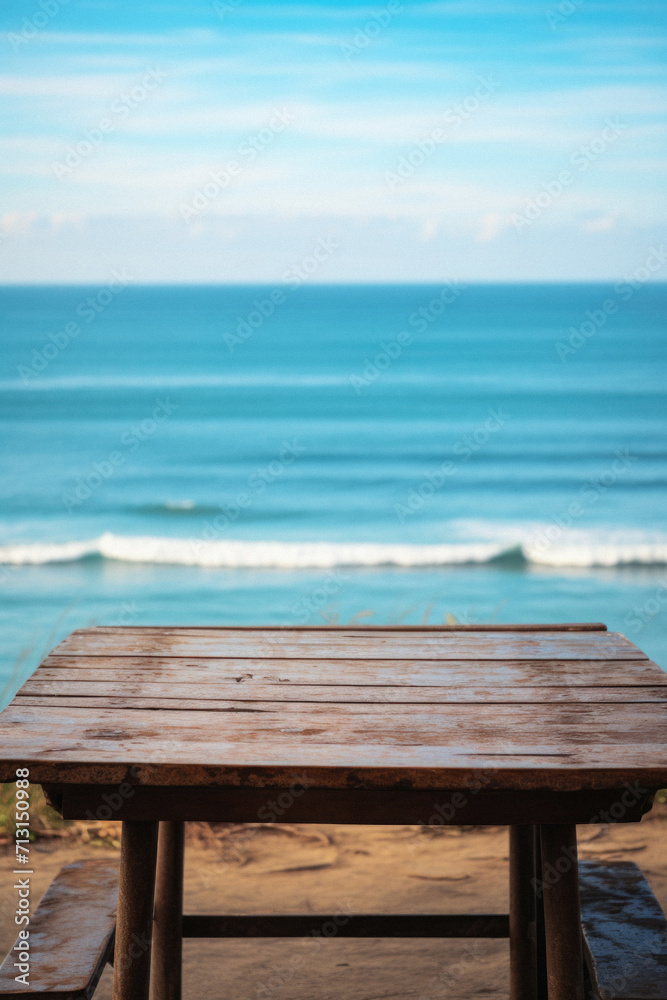 Wooden table ocean bokeh background, empty wood desk surface product display mockup with blurry sea water sunny beach abstract summer travel backdrop advertising presentation. Mock up, copy space.