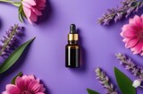 blank essence oil bottle with flowers, flatlay composition on purple backdrop. cosmetic products