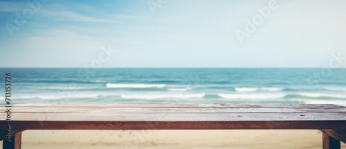 Wooden table ocean bokeh background  empty wood desk surface product display mockup with blurry sea water sunny beach abstract summer travel backdrop advertising presentation. Mock up  copy space.