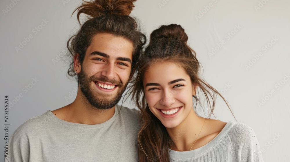 Studio portrait of a joyful and loving Caucasian couple with stylish hair. Studio portrait of a joyful and loving Caucasian couple with stylish hair.