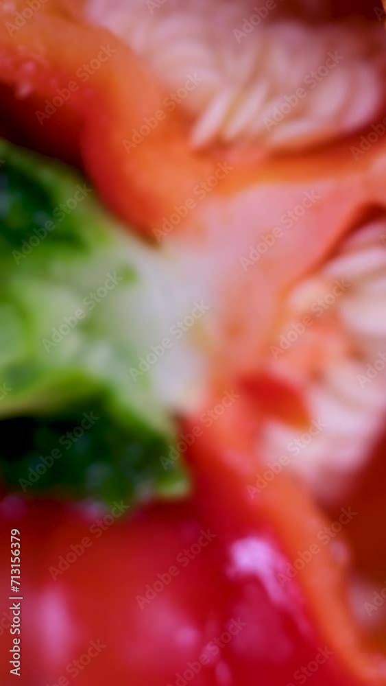 Cutting ripe red pepper, sweet red pepper is cut into pieces across the pepper. High quality 4k footage Cutting ripe red pepper, sweet red pepper is cut into pieces across the pepper. High quality 4k footage