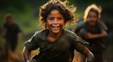 A joyful child revels in the freedom of the outdoors, their face smeared with mud and a contagious smile on their clothing-clad form