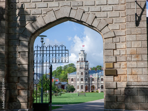 Entrance to the Sigulda new Castle with its tower and its garden. Built in 19th century by the kropotkin family it's neo gothic castle called Siguldas Jauna Pils. photo