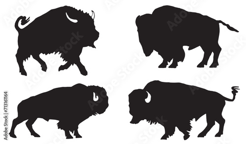 Vector silhouettes of bisons isolated on white , graphical illustration	
