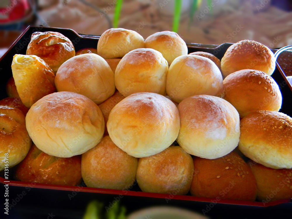 Bread rolls on a tray in the local market
