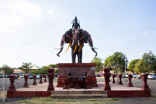 Hindu god Indra riding erawan elephants creatures for thai people travelers travel visit and respect praying at Ban Ta Klang or Taklang Elephant Village Study Centre at Tha Tum city in Surin, Thailand photo