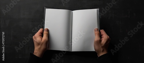 Hand opening blank white book cover mockup template Clear booklet front surface design mock up Arm holding opened textbook diary Reading clean notebook copy Closed catalogue presentation displa