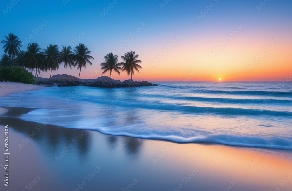sunset on the sea  beach with waves and palms