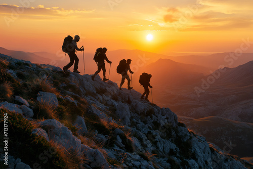 Mountaineers Navigating Rocky Slopes at Dusk