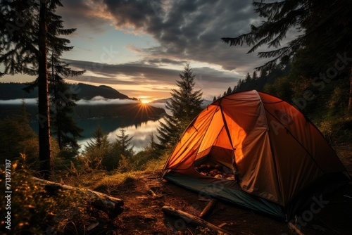 Amidst the tranquil beauty of a secluded hilltop, a lone tent stands beneath a vibrant sky, its tarpaulin glowing in the warm hues of sunrise and sunset, as the surrounding mountains and lake offer a