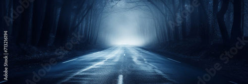 foggy dark road in the forest, abstract background photo