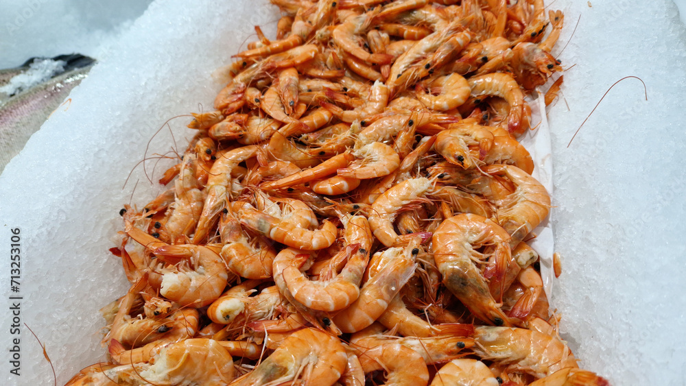 Chilled boiled shrimp in a supermarket or grocery store, close-up. Seafood Chilled boiled shrimp in a supermarket or grocery store, close-up. Seafood