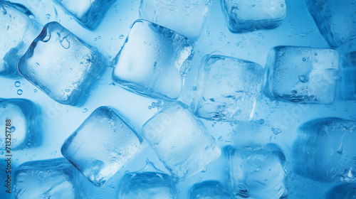 Captivating Overhead Shot of Crystal Clear Ice Cubes on Blue Background with Refreshing Droplets – Ideal Copy Space for Cool Summer Drink Concepts and Beverage Advertising