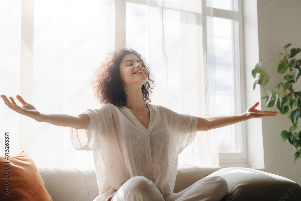 Relaxed young woman meditating in lotus position Relaxed young woman meditating in lotus position