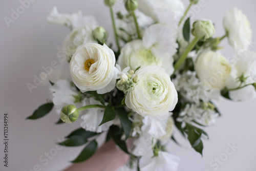 Bouquet of white flowers. Peony roses in the interior. Bouquet for brides and friends.