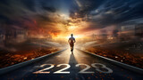 A solitary person strolling during dawn,,
A man walks on a long road with the numbers 2023 on it
