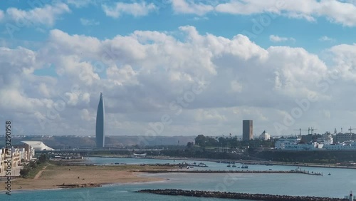 view from afar shows the Hassan Mosque and the Mohamed VI Tower in Rabat, Morocco photo