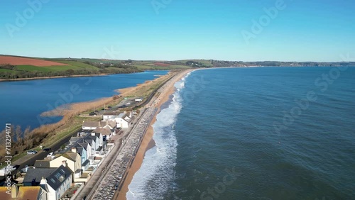 Flight along and over the beach at Slapton Ley from Torcross in Devon photo