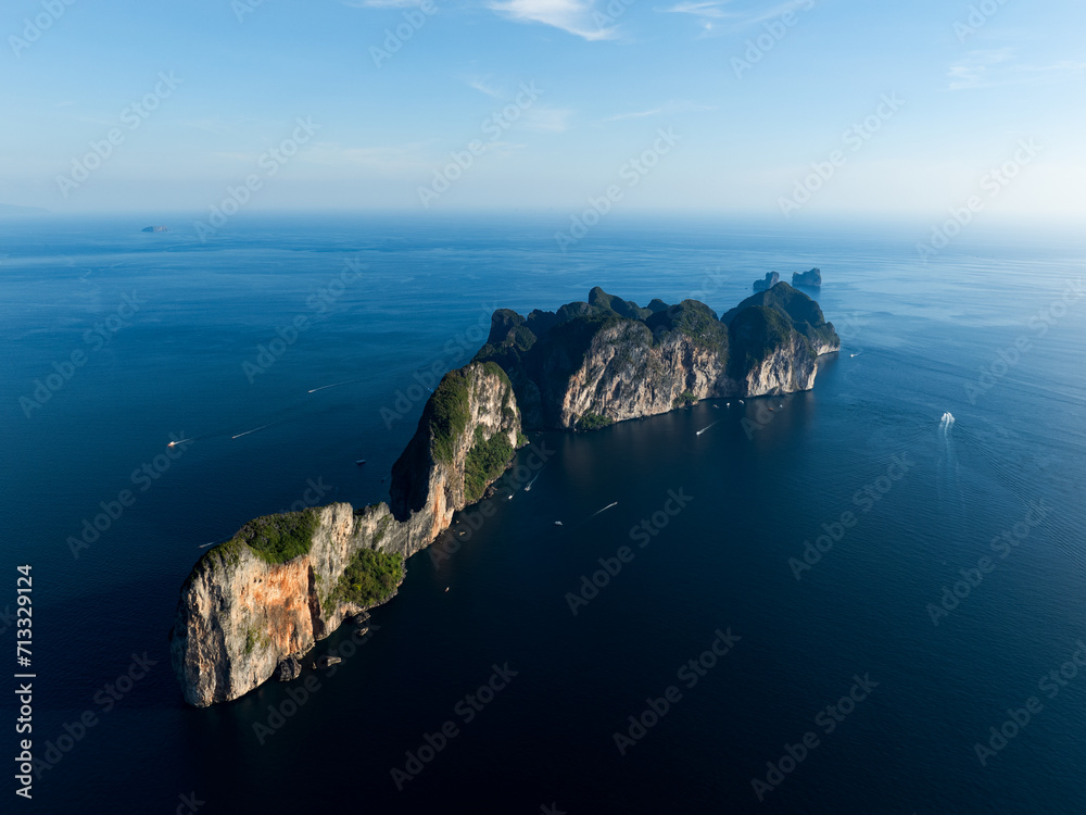 View from above, aerial view of Ko Phi Phi Lee, a ring of steep limestone hills surrounding Maya Bay. Andaman Sea, Phi Phi Islands, Krabi, Thailand.