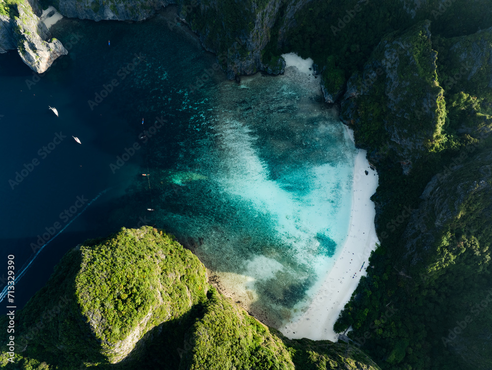 View from above, aerial view of Ko Phi Phi Lee, a ring of steep limestone hills surrounding Maya Bay. Andaman Sea, Phi Phi Islands, Krabi, Thailand.