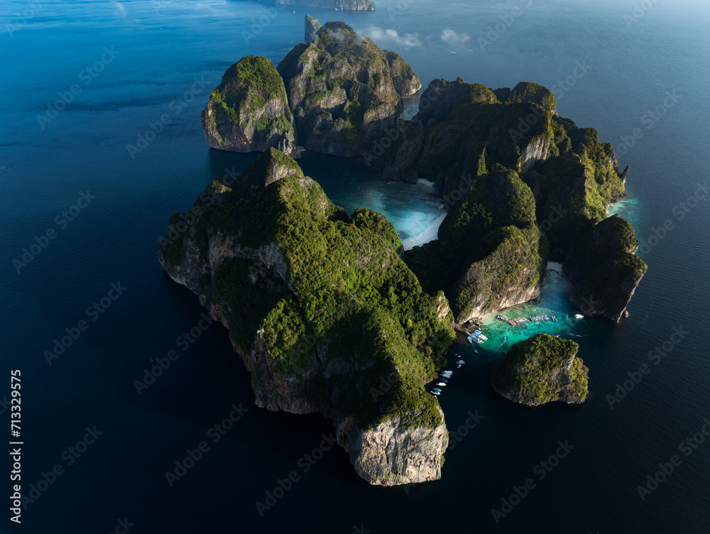 View from above, aerial view of Ko Phi Phi Lee, a ring of steep limestone hills surrounding Maya Bay. Andaman Sea, Phi Phi Islands, Krabi, Thailand.