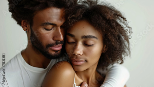 Multiracial Couple Embraces Each Other, Skin to Skin, in a Close-Up Display of Multiethnic Love and Unity