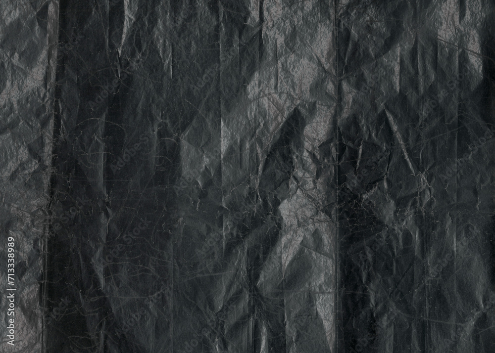 Dust and scratches recycled paper for design. Distressed overlay surface. Black shabby aged photo editor layer. Ripped grunge abstract background. Copy space.	