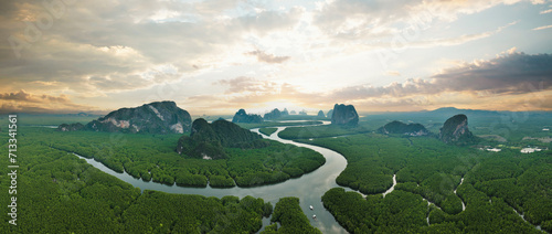 Obraz na płótnie View from above, aerial shot, stunning panoramic view of Ao Phang Nga (Phang Nga Bay) National Park featuring a multitude of limestone formations rising from the sea. Thailand. w salonie