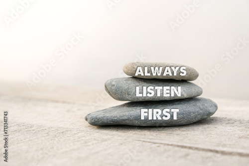 Always listen first words written on stones. Copy space
