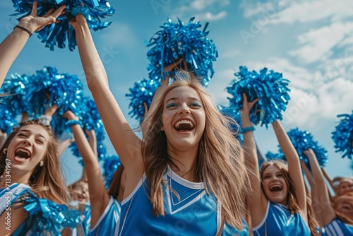 Group Of Enthusiastic Cheerleaders, Empowering The Team With Their Energy And Spirit photo