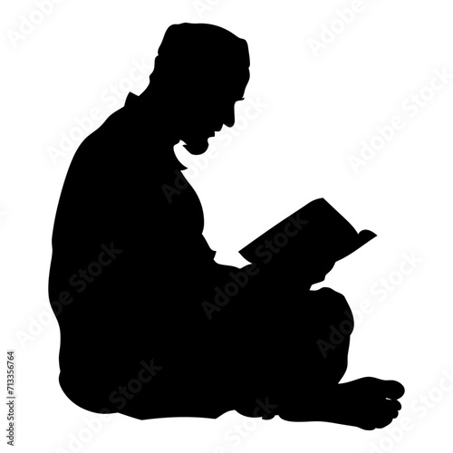 Silhouette of a Muslim man reading the Koran in black color only
