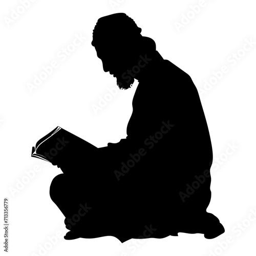 Silhouette of a Muslim man reading the Koran in black color only