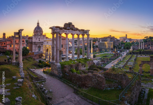 Panorama of the Roman Forum at sunrise in Rome, Italy with ancient buildings and landmarks