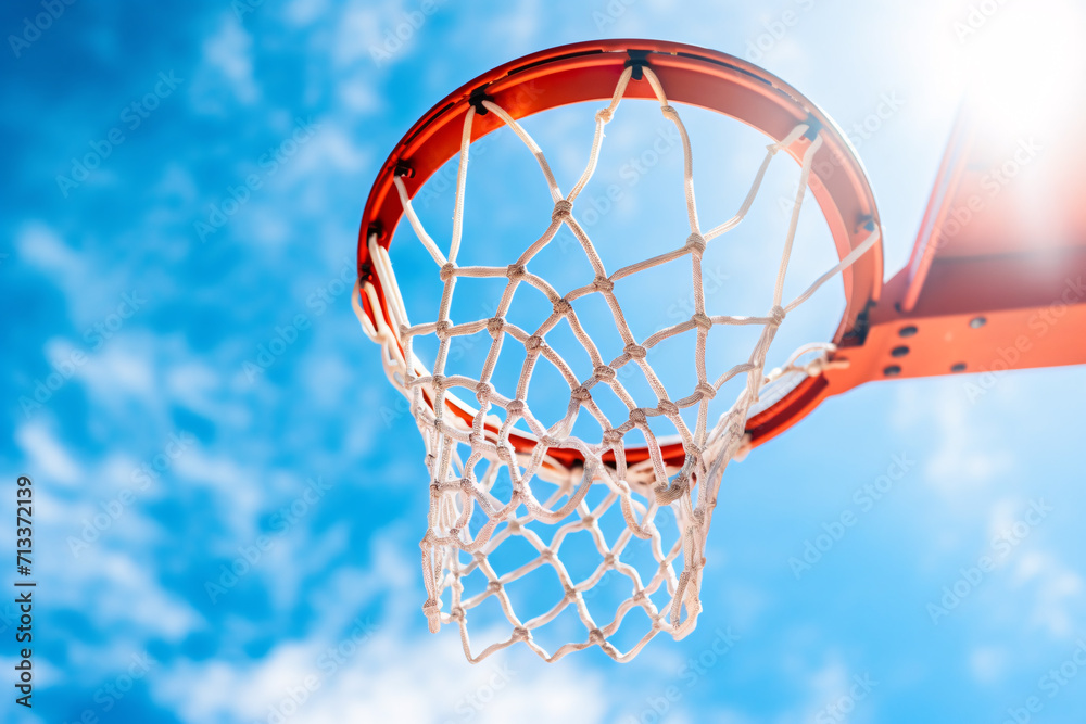 A basketball goal on a blue sky background.