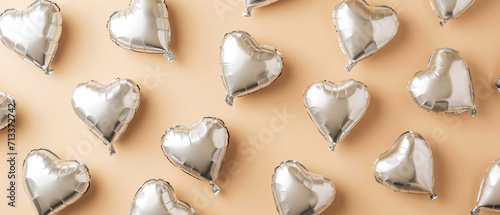 Mockup of silver hearts shaped on beige. Flat lay. Top view. View from above. Valentine's Day. Holidays background. Generative Ai