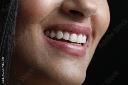 close up of a woman smiling