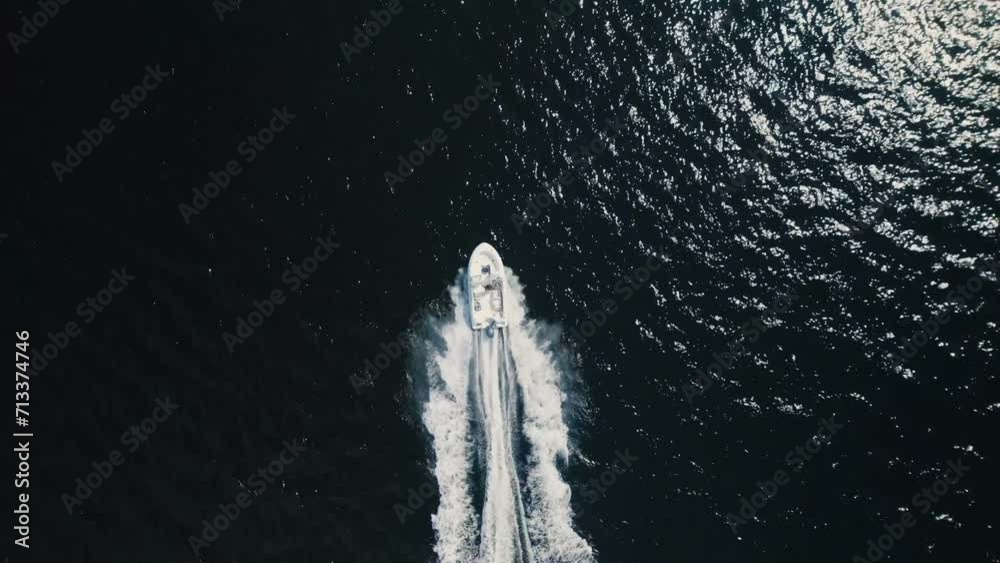 Drone shot of a motorboat in the Atlantic Ocean, Halifax, Canada. Nova Scotia