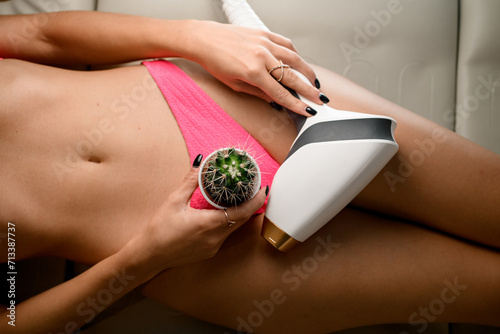 Quadro em tela Hair removal for smooth skin with effective laser apparated woman in a pink unde
