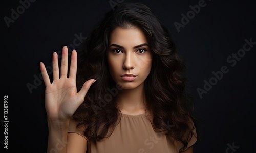 A Woman Celebrating Success With Raised Hand