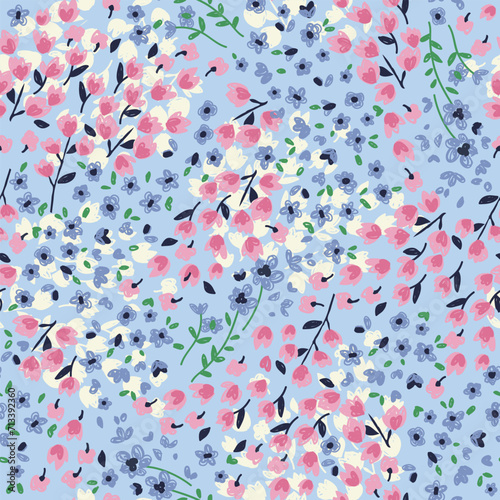 Pretty ditsy floral seamless pattern in blues and pinks. Vector repeat pattern. Abstract hand drawn small flowers and leaves. Girly cute print for files, teens, fashion and nightwear 