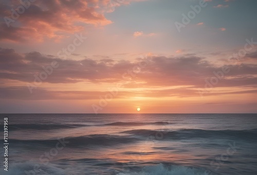 a sunset view of the ocean with some waves in front