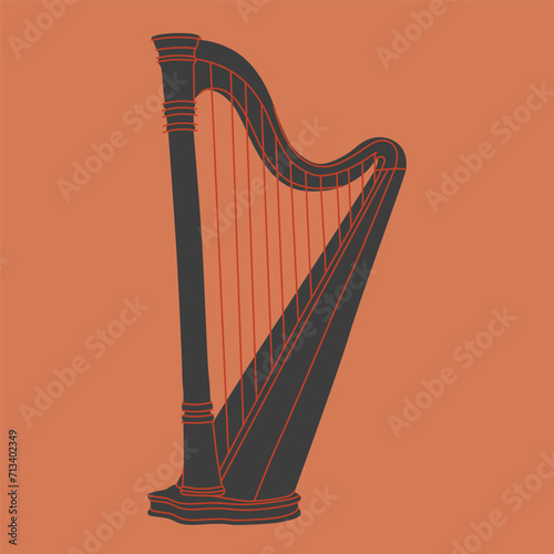 Antique, old stringed musical instrument is a classical wooden harp. Historical musical instrument harp, for festive.